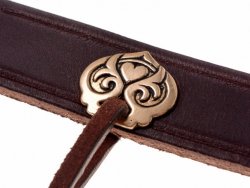 Viking era belt stud in use