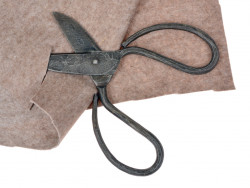 Medieval scissors in use