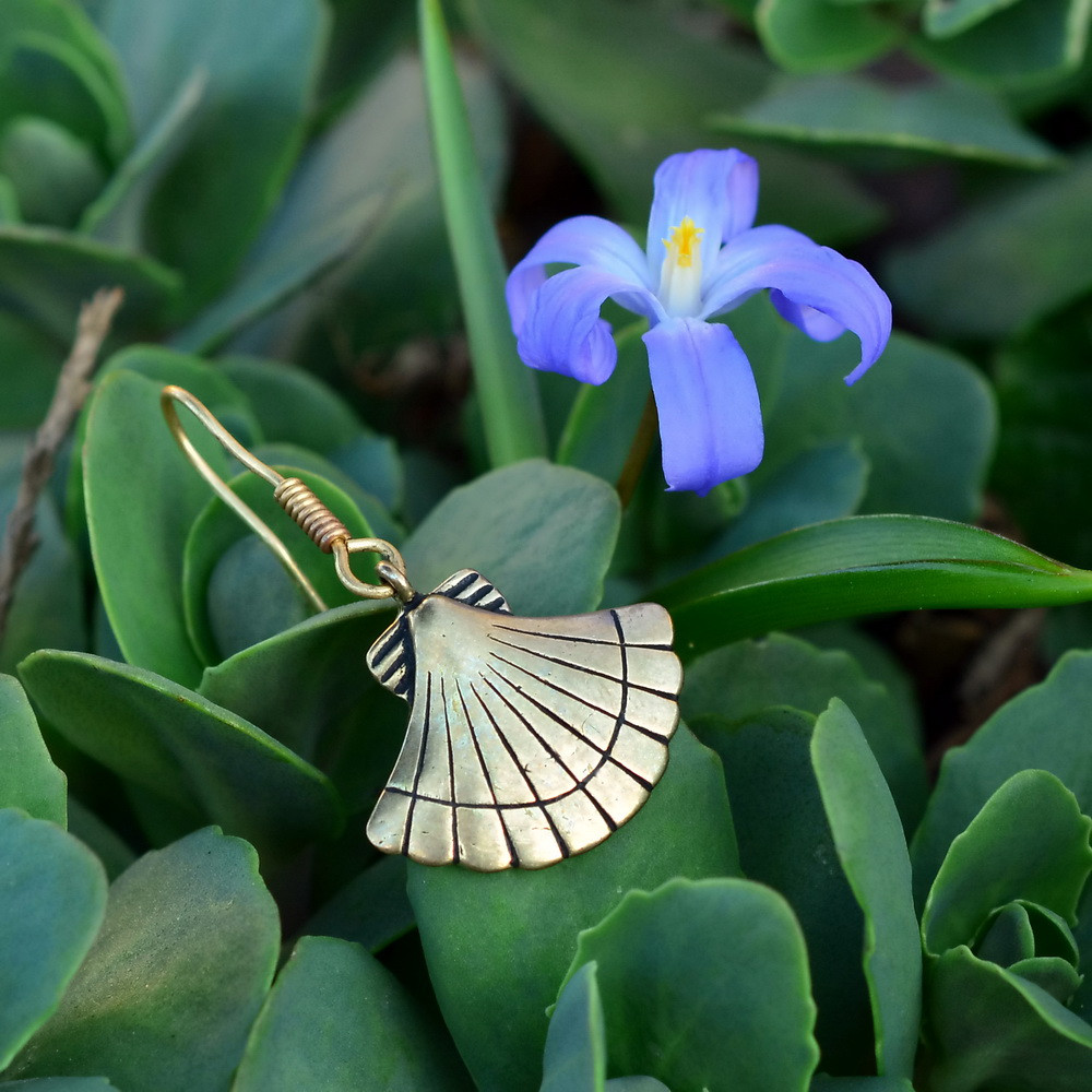 Medieval scallop earring in nature
