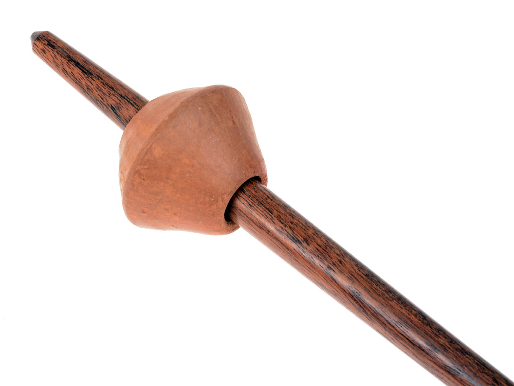 Spinning whorl on a spindle stick