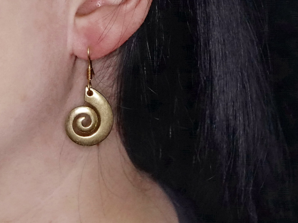 Celtic earrings in use