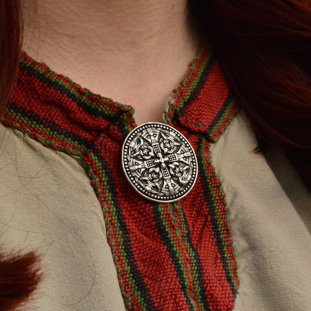 Viking Age disc brooch in use